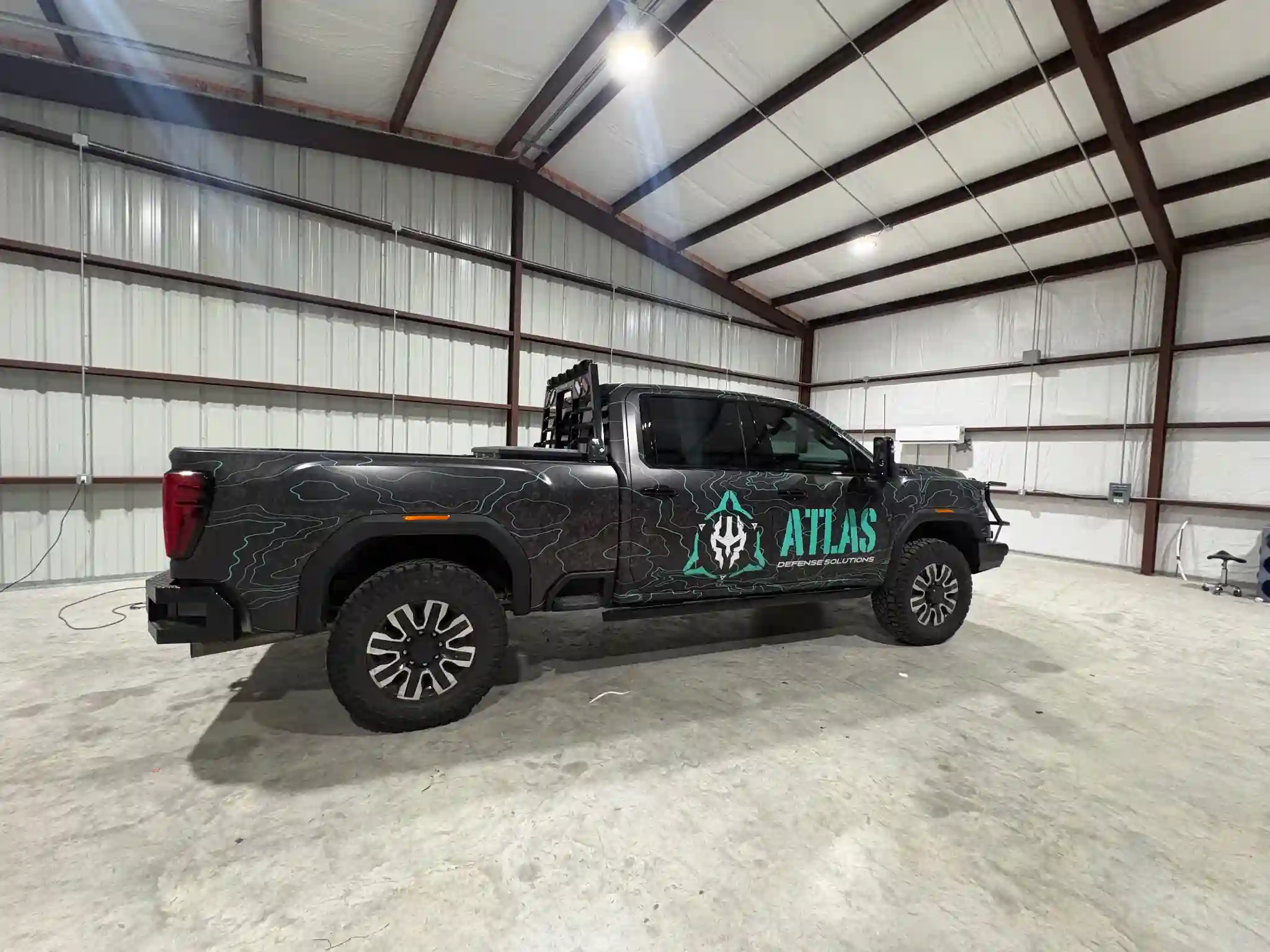Atlas truck wrapped with custom commercial graphics